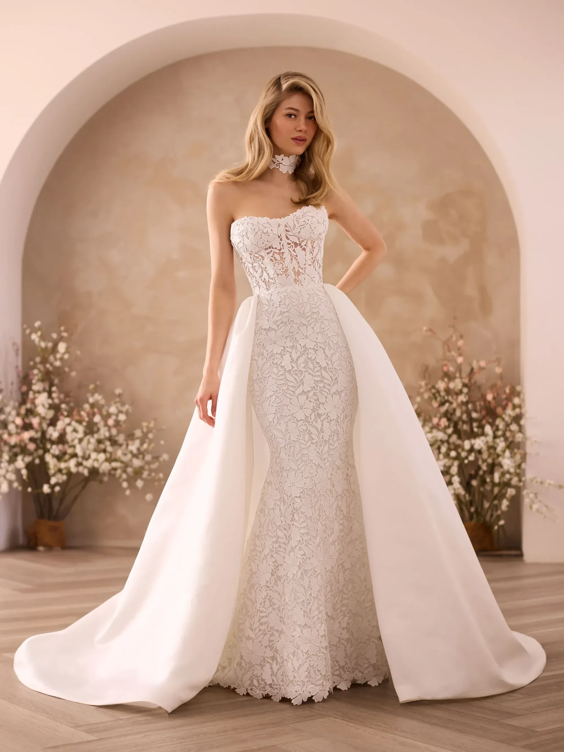 Model wearing a white gown